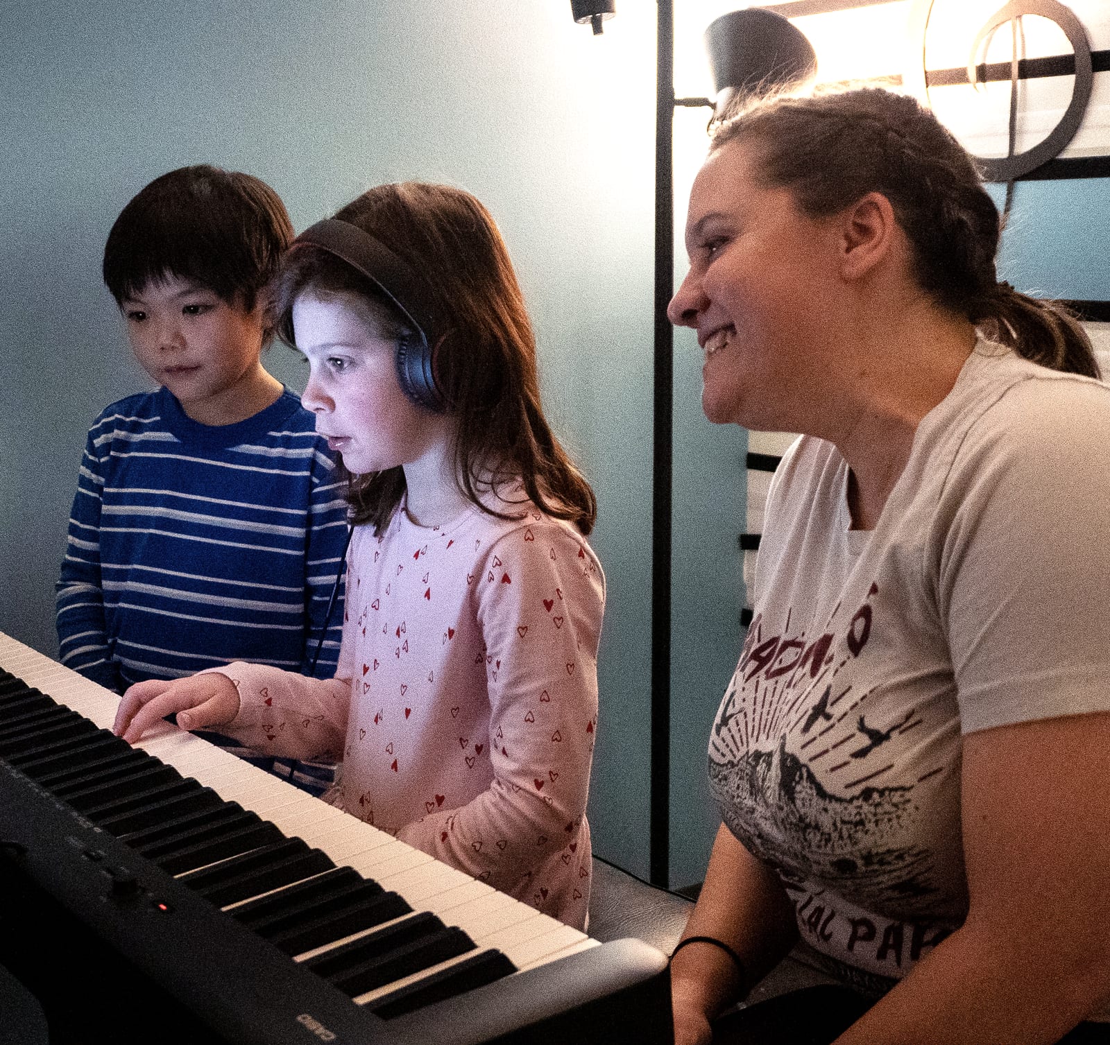 A piano student performing on the Twelve Tone stage during the Spring Piano Showcase in Glenview, IL